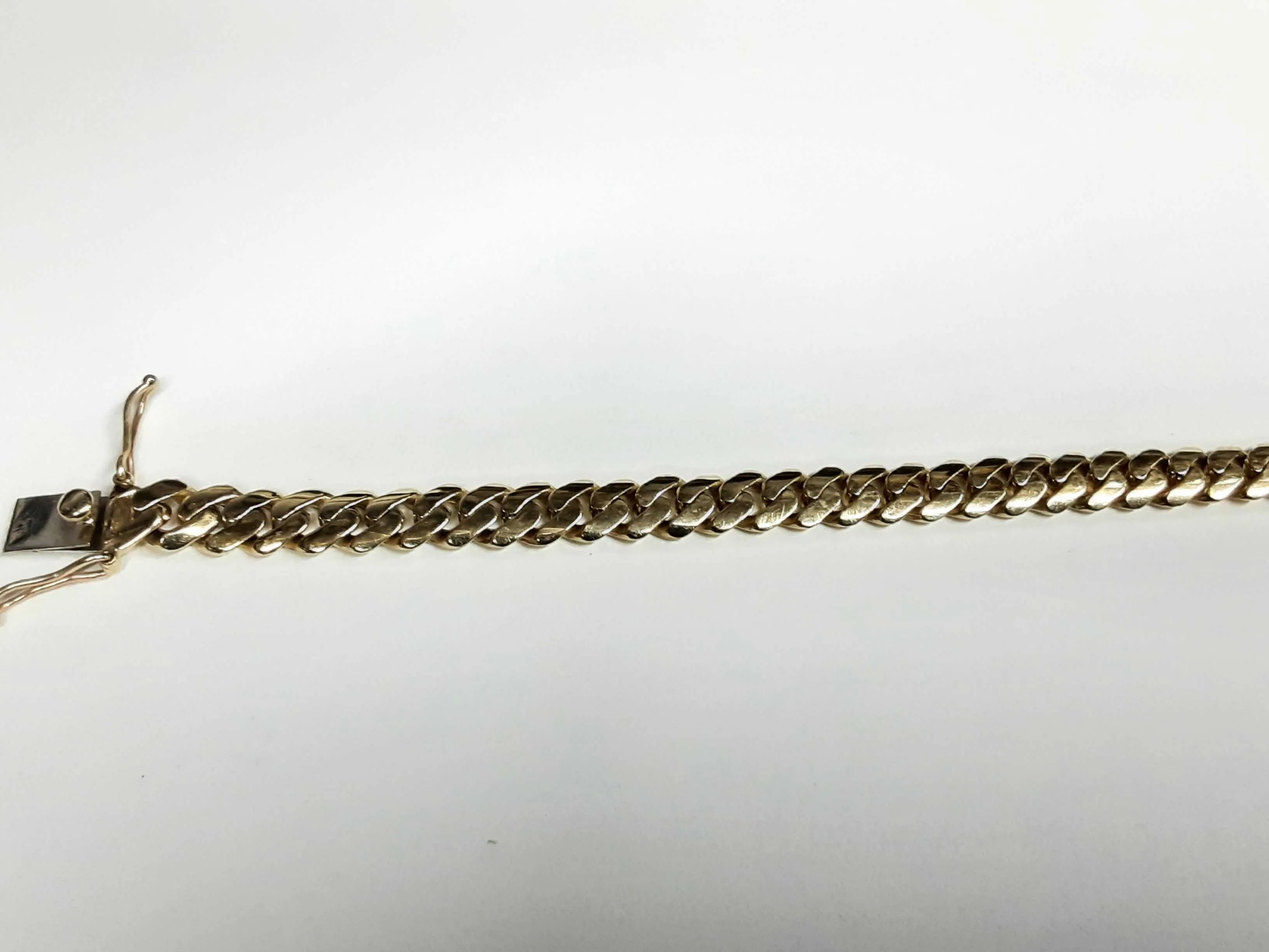 10k Yg 26.4 Grams Cuban Link Bracelet