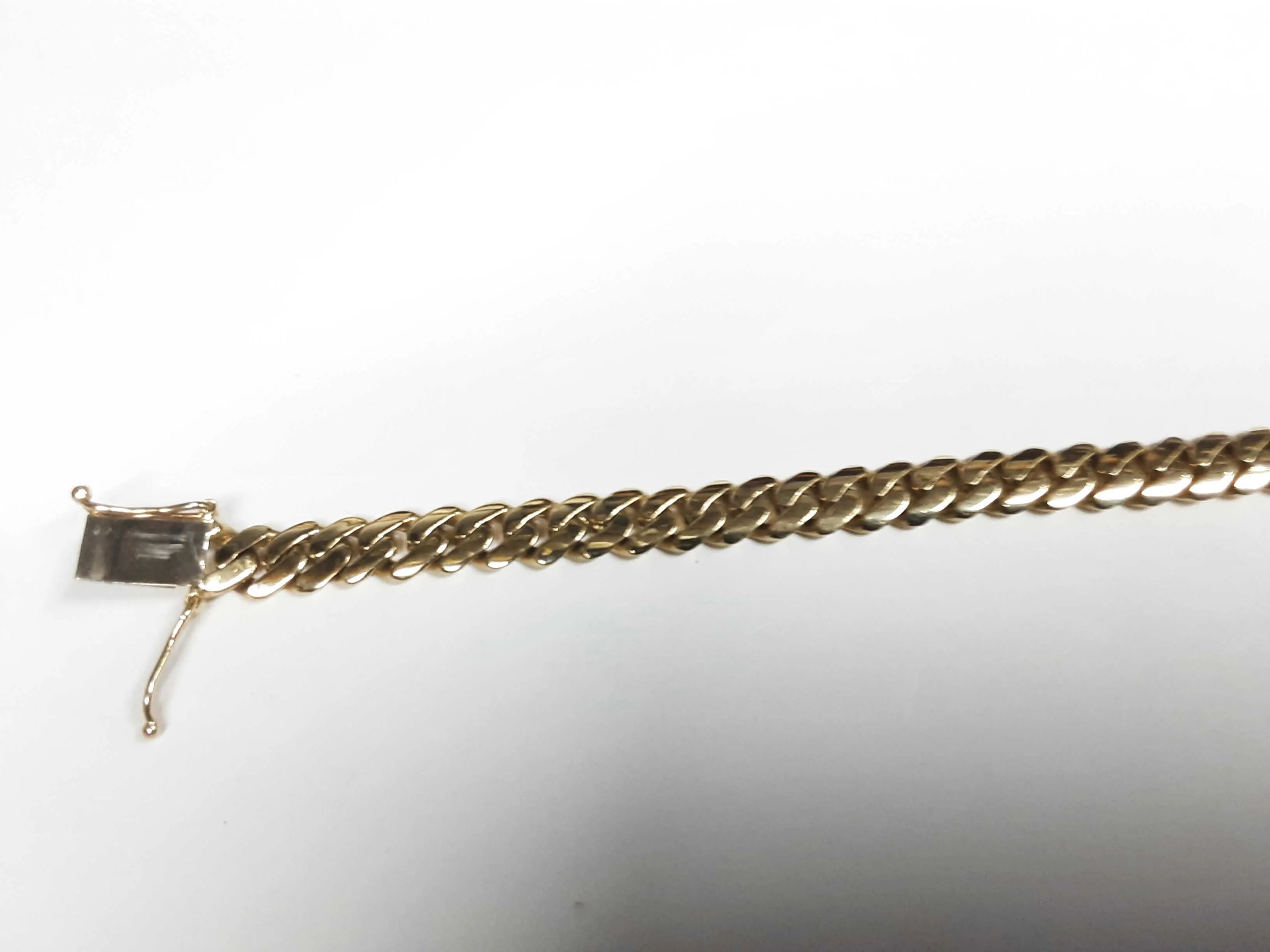 10k Yg 26.4 Grams Cuban Link Bracelet