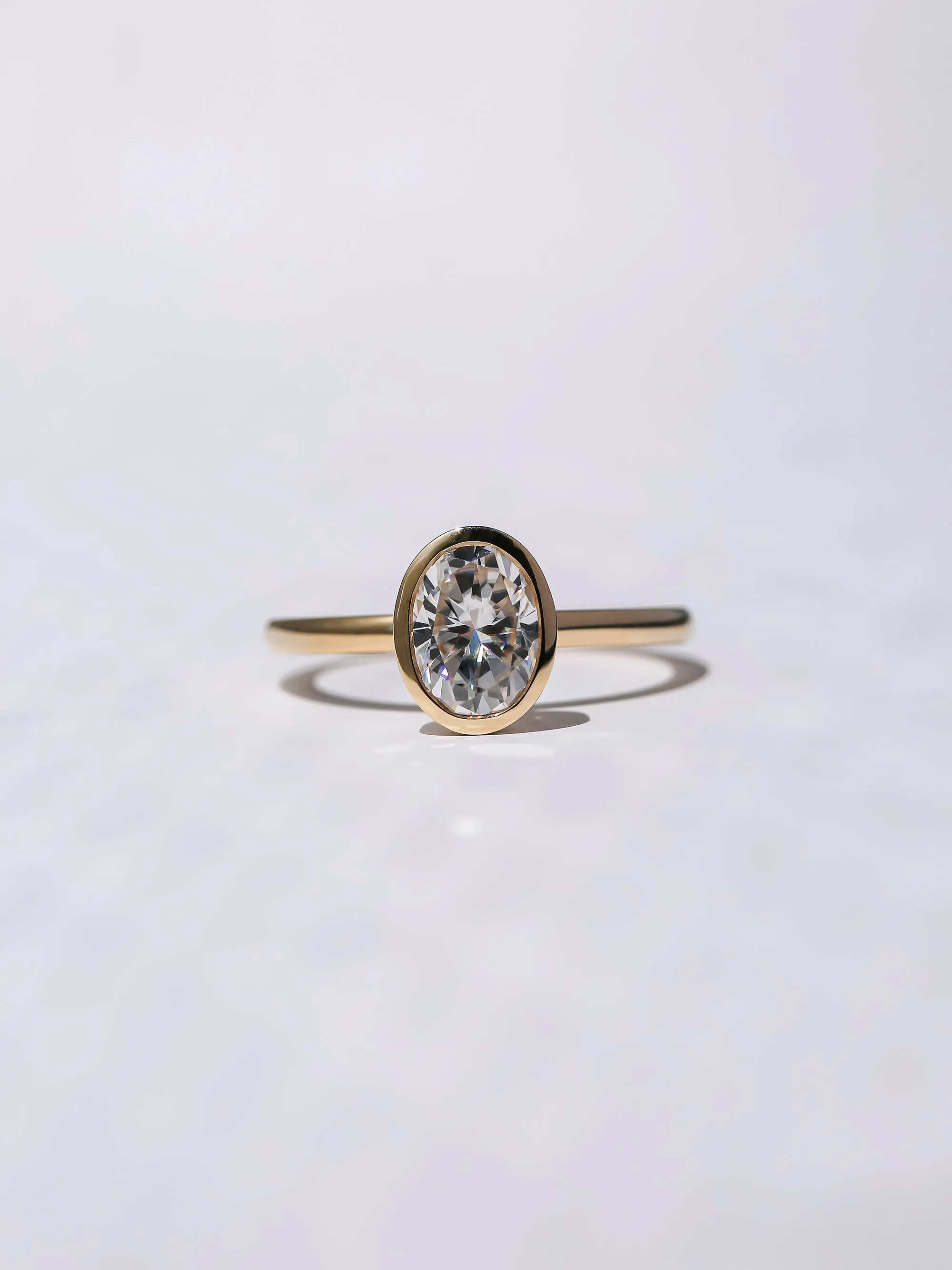 1.50ct Oval Posh X Bezel Ring