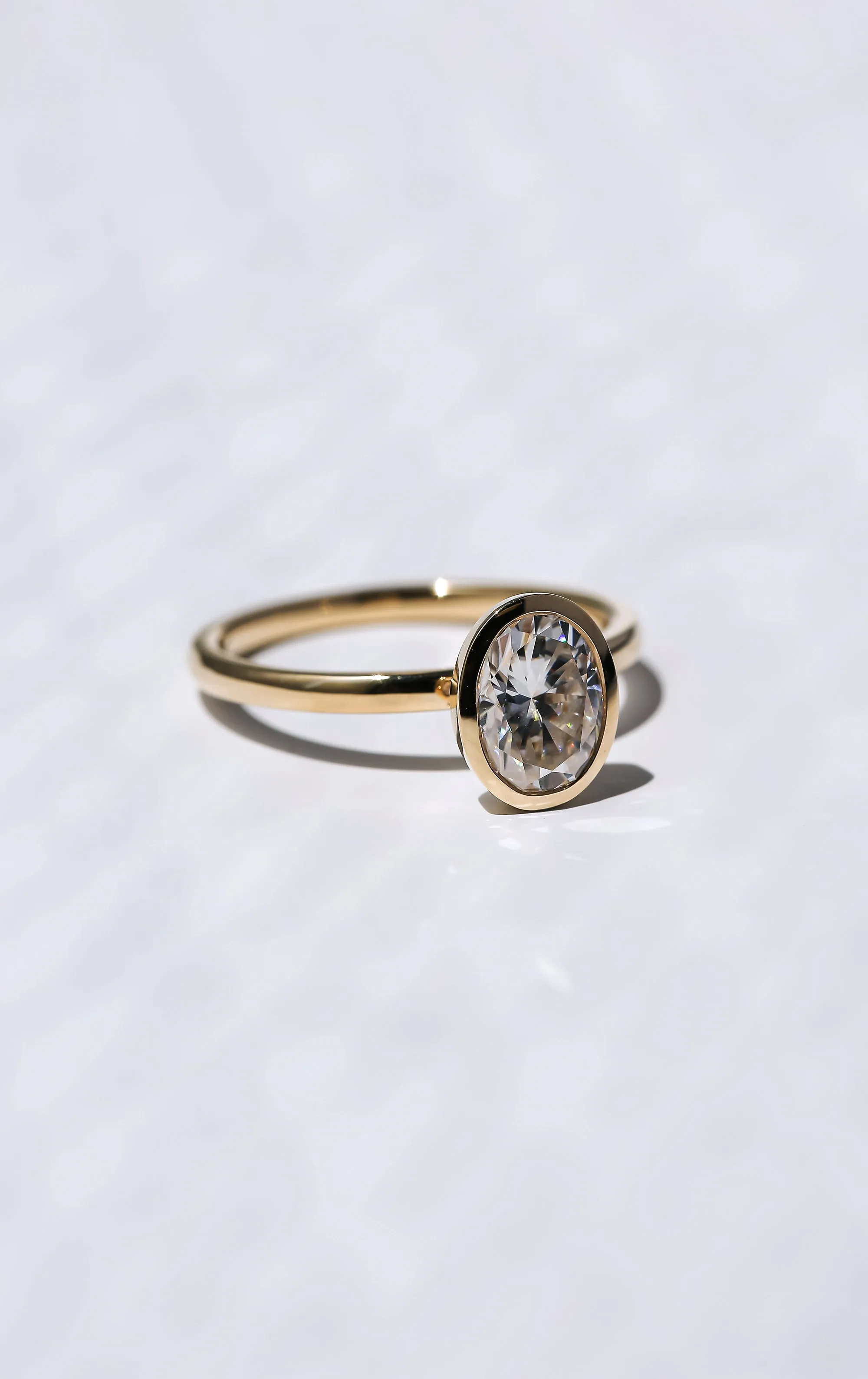 1.50ct Oval Posh X Bezel Ring